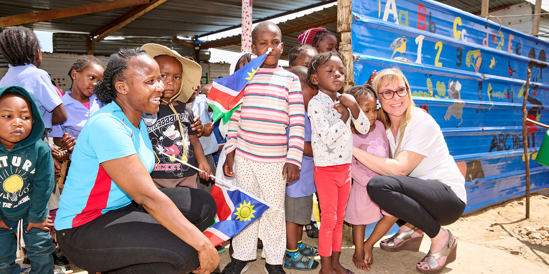 Namibian women and children with Namibian flags